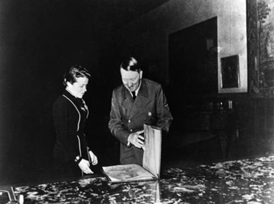 Adolf Hitler awards Hanna Reitsch the iron cross 2nd class in the Berghof great hall